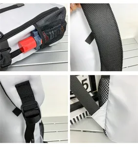 Detailansicht eines grossen grauen Rucksacks mit Netztasche, Schulterriemen und Schnalle.