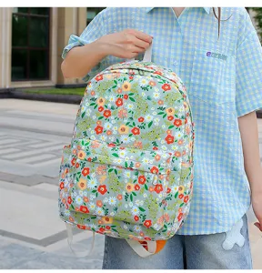 Floral print casual school backpack with spacious compartments for daily use and travel needs.