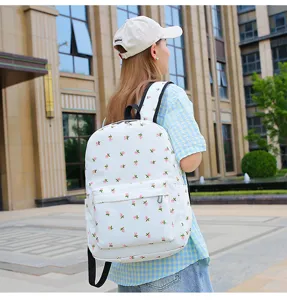 Floral print student backpack scene detail showing casual daily style and spacious design.