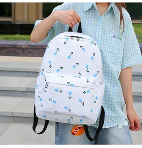 White canvas backpack with blue tulip floral print, casual school bookbag for students.