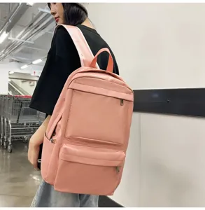 Rosa PU Leder Rucksack für Pendeln und Reisen. Großes Kapazität mit Fronttaschen.