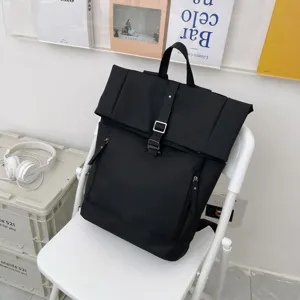 Casual solid black roll-top backpack with large capacity, durable straps and stylish buckle.