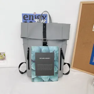 Casual solid color grey roll-top backpack for daily student use, spacious and stylish.