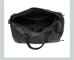 Grand sac de voyage noir vue intérieure montrant la conception de rangement à compartiments.