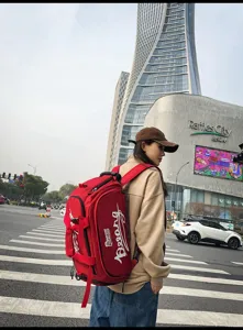 Sac à dos multifonctionnel de grande capacité pour voyages, cartable étudiant rouge.