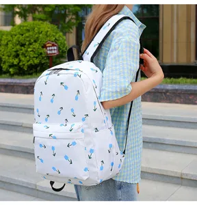 Floral print student backpack with blue tulip pattern, stylish and spacious daily school bag.