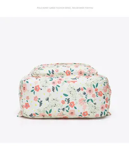 Detailed view of floral pattern casual backpack, large capacity student school bag interior.