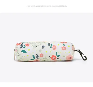 Floral cylindrical pencil case with zipper and hook, stylish student stationery bag.