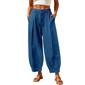 Detailed view of blue cotton linen harem pants with side pockets and elastic waist