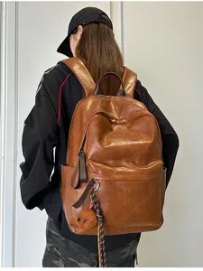 Vintage PU Leder Rucksack für Damen und Herren, retro lässige Schultasche für Pendler.