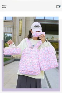 Cute 4-piece school backpack set for teenage girls, large capacity lightweight bookbag.