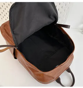 Brauner PU Leder Rucksack Innendetail, Retro Schulranzen, lässige Alltagstasche für Pendler.
