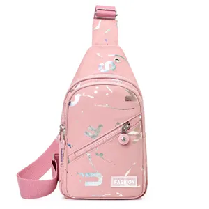 Pink sling bag for women, stylish crossbody daypack with silver print and adjustable strap.