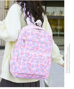 Cute pink geometric pattern school backpack for teenage girls, casual student daypack.