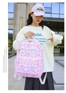 Detailed view of the cute pink geometric backpack, showing spacious pockets and durable straps.