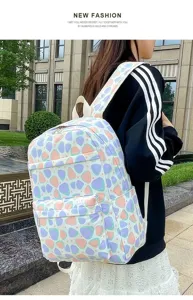 Cute large capacity casual backpack with colorful geometric pattern for school students daily use.