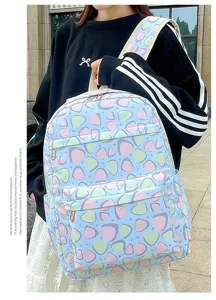 Casual stylish student backpack featuring a cute pastel geometric pattern with functional pockets.