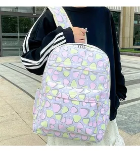 Detail view of the casual student backpack with cute colorful pattern, large capacity and daily use.