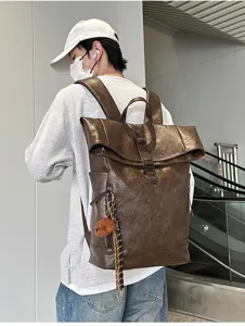 Retro brown PU leather roll top backpack detailed view, stylish casual travel computer bag.