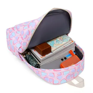 Pink and blue geometric print school backpack, large capacity casual daypack for students.