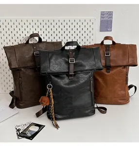 Detail view of the vintage PU leather roll top backpack, showing premium texture and craftsmanship.
