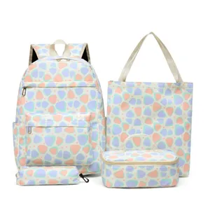 Cute 4-piece pastel geometric school backpack set for students, lightweight and large capacity.