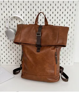 Vintage PU leather roll-top backpack for men and women, stylish laptop travel daypack.