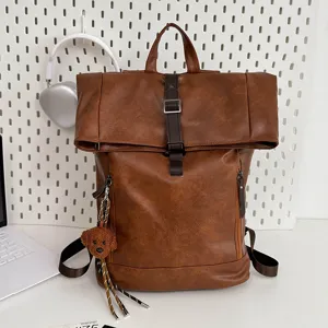 Vintage brown PU leather roll top backpack for daily travel, casual laptop school bag.