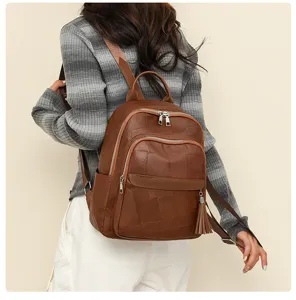 Damen Weichleder Rucksack mit Quaste, vintage Patchwork Design für Schule und Alltag.