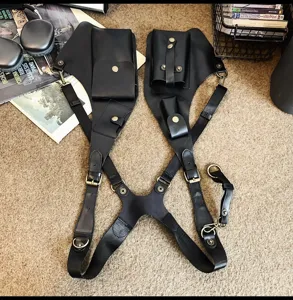 Black PU leather tactical shoulder holster bag, multi-pocket streetwear chest rig harness.