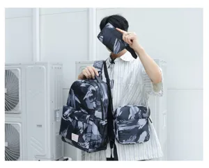 Modischer schwarzgrauer Camouflage Rucksack Set für Herren und Damen, robuster Schulranzen.
