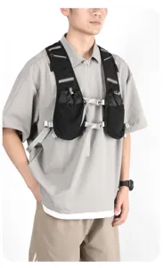 Detailed view of black outdoor running vest backpack with multi-pockets and breathable mesh fabric.