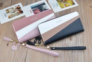 Stylish women's long zipper wallet with color block design, cute tassel, and rabbit pendant.