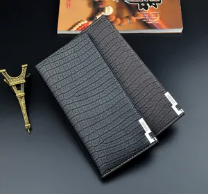 Men's long vertical wallet featuring crocodile texture, soft leather, and multi-card slot detail view.