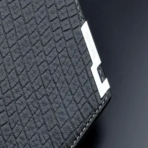 Men's short leather wallet with stylish crocodile pattern texture and metallic logo detail.