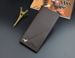Detail view of brown men's long vertical soft leather wallet with card slots and sleek design.
