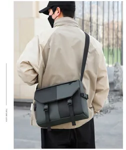 Detailed showcase of the waterproof oxford messenger bag with durable adjustable straps.