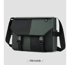 Oxford fabric messenger bag detail showing durable dual buckles and adjustable shoulder strap.