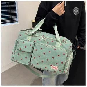 Corduroy travel bag with cute strawberry pattern, large capacity and multiple pockets.