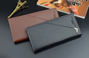 Detailed view of men long leather wallet, soft texture with multiple card slots and metal corners.