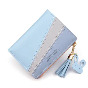 Women's short color block wallet with zipper, tassel and cute bunny pendant for daily use.