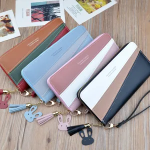 Womens long wallet fashion colorblock zipper clutch purse with wrist strap and cute pendant.