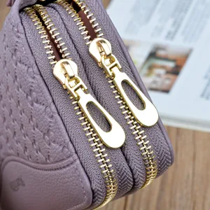 Women's long double zipper leather wallet, large capacity clutch and coin purse in purple.