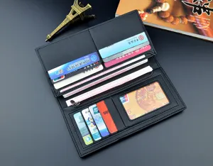 Men's black long wallet interior detail showing card slots and zippered pocket for cash.