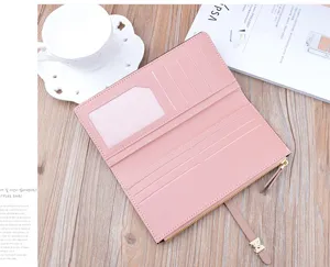 Pink long women wallet with multiple card slots and zipper pocket for daily use.