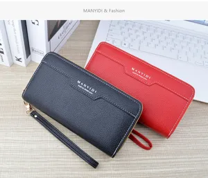 Detailed view of long double-zipper leather wallet with wrist strap and large capacity.
