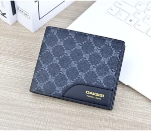 Close-up view of the men's short wallet showing detailed plaid print and soft leather texture.