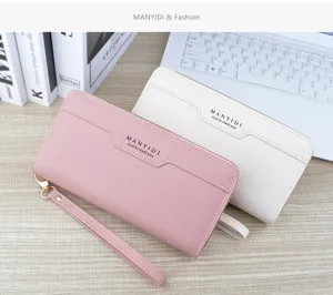 Detail view of double zipper long wallet with wrist strap soft leather clutch purse pink white