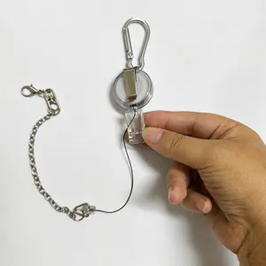 Detail shot of the parrot bird leash retractable reel with adjustable positioning clip.