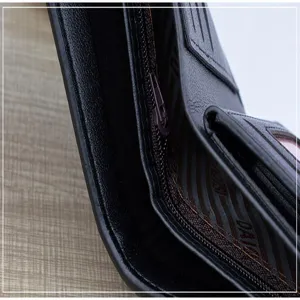 Close-up detail view of black men's short leather wallet with multiple card slots and zipper.